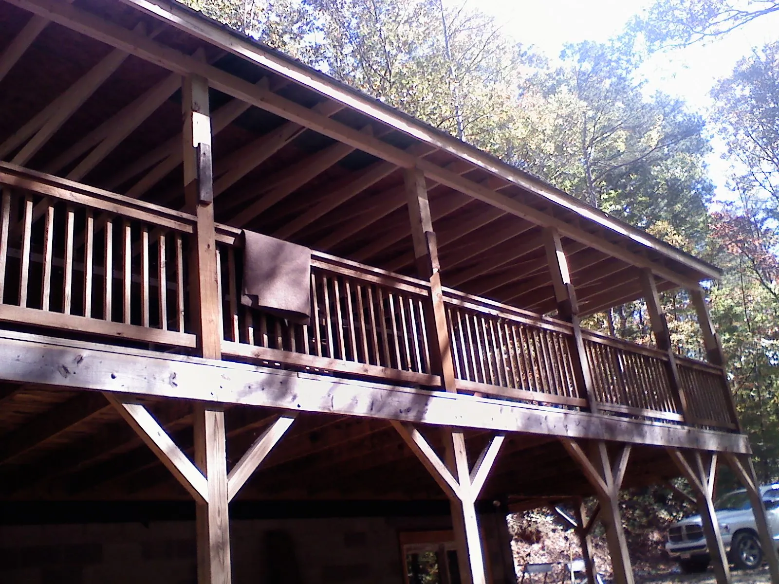 Timber framing under a new elevated porch and deck — Roof Leak Repair in Phelan by Roofing Brothers